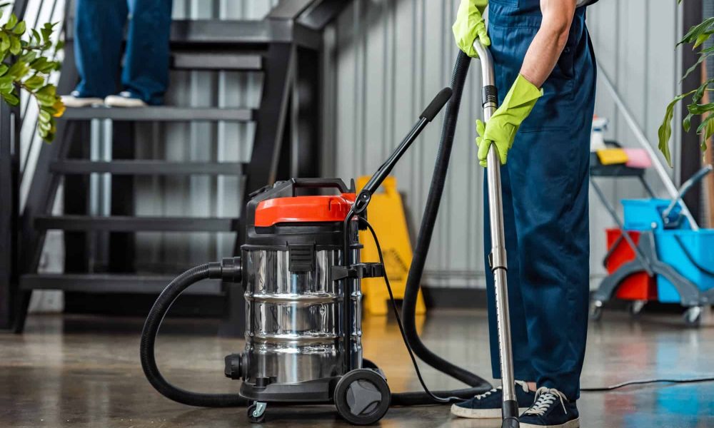 cropped-view-of-cleaner-in-uniform-cleaning-floor-with-vacuum-cleaner.jpg